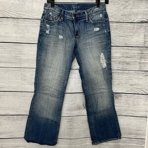 Sacred Blue Jeans with rips